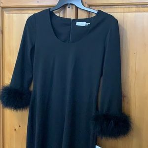 Long sleeve black dress.